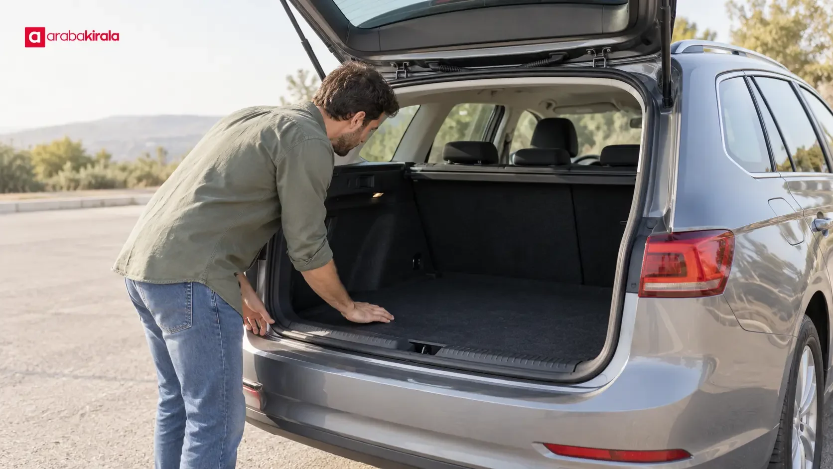 A rental car’s seats and trunk being checked before pickup