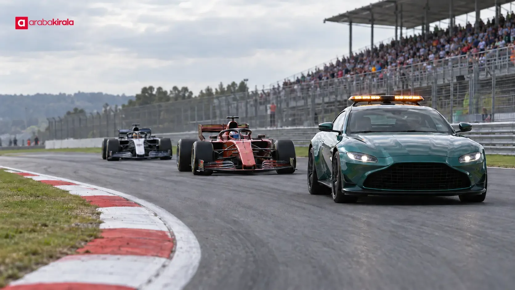 Formula 1 cars following the Safety Car on a race circuit
