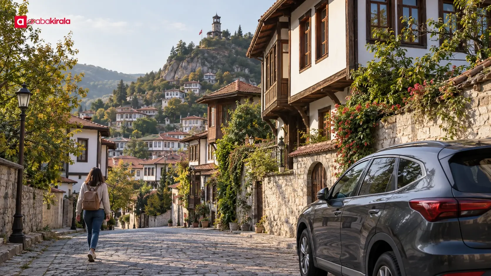 Traditional houses in Göynük’s historic center and Zafer Tower on the hillside
