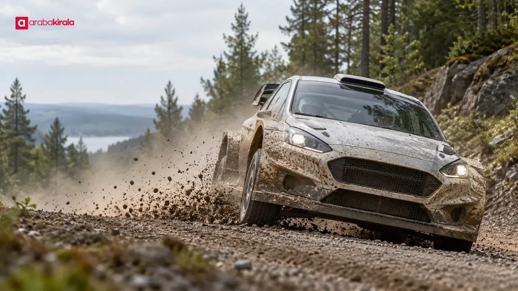A rally car showing body movement through a gravel-stage corner