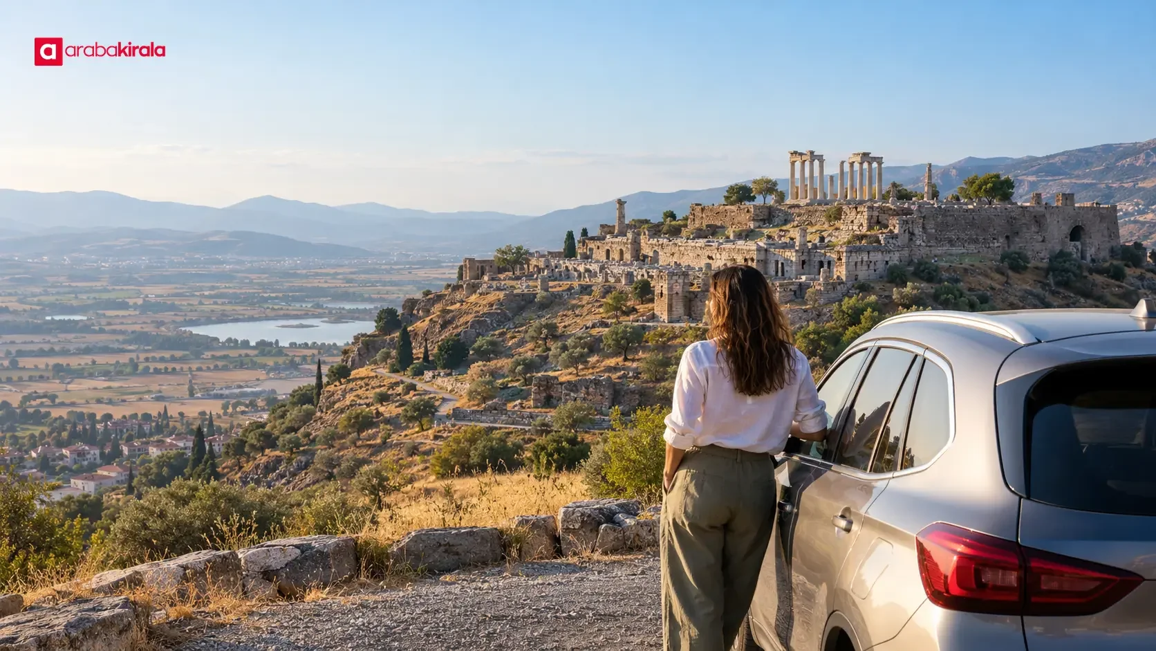 Visitors planning a driving route between the Pergamon Acropolis and Asclepion