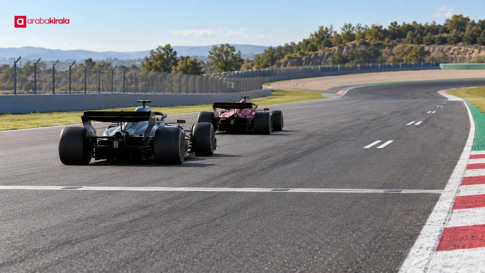A Formula 1 circuit running from a corner exit onto a long straight